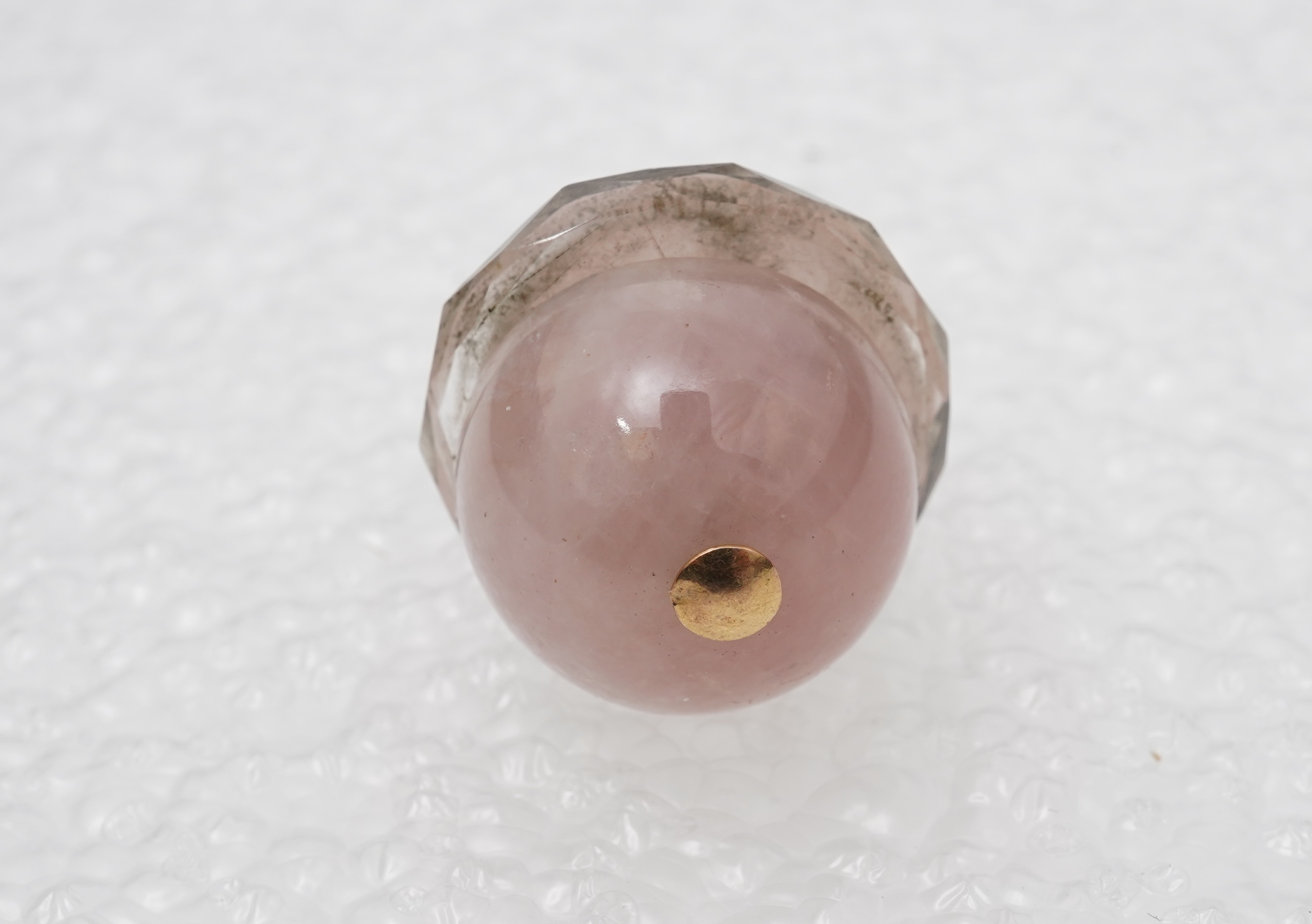 A rose quartz and rock crystal pendant, early 20th century